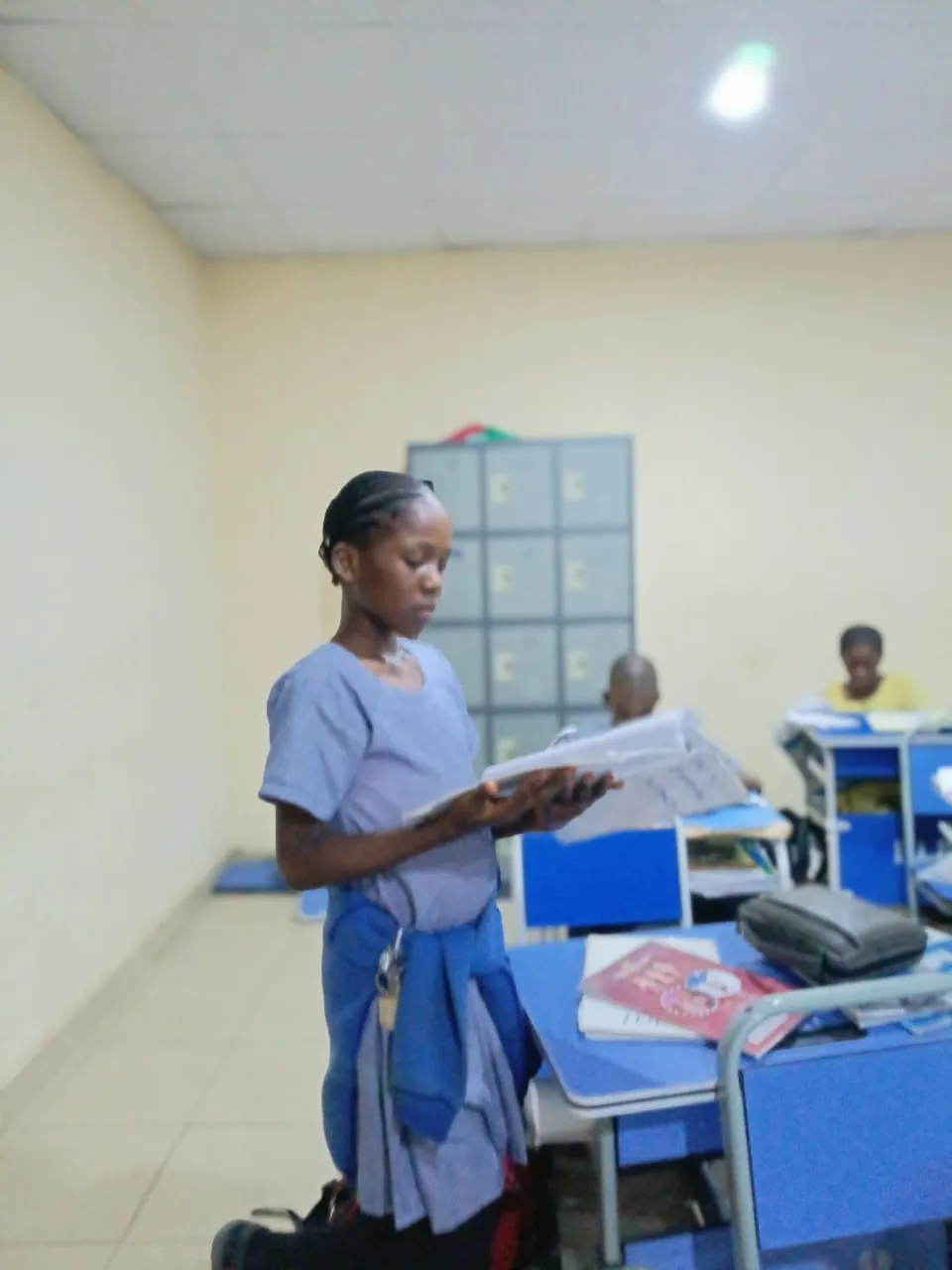 Facilitator guiding students